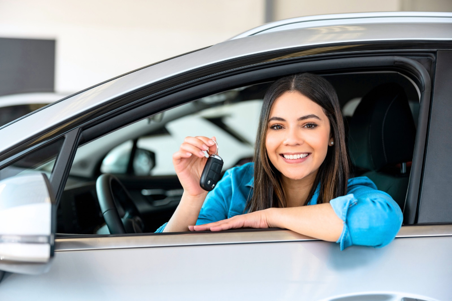 Woman with a Rental Car