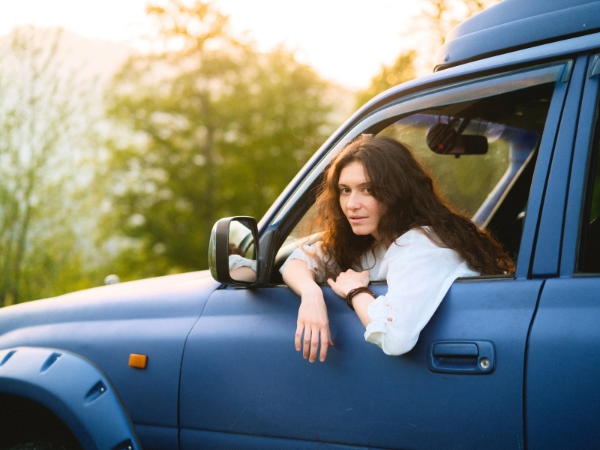 Woman Driving a 4x4 Car