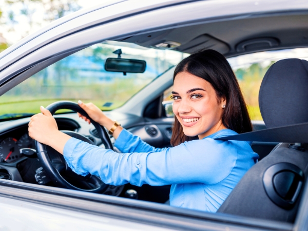 Woman with a Rental Car