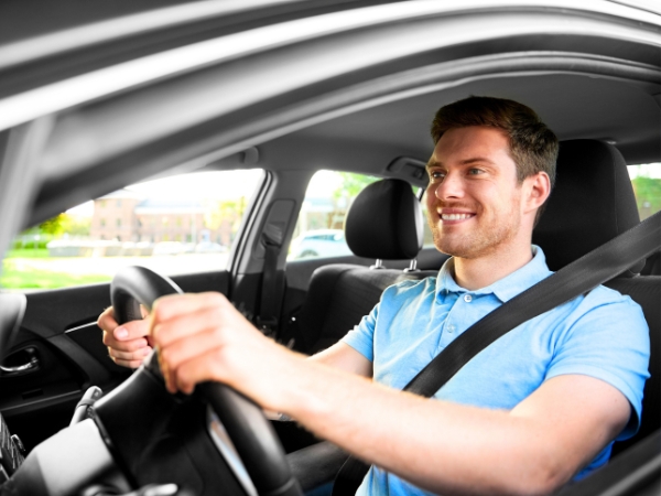 Man Driving a Car