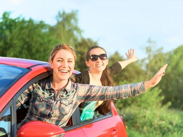 Woman Driving in Nature