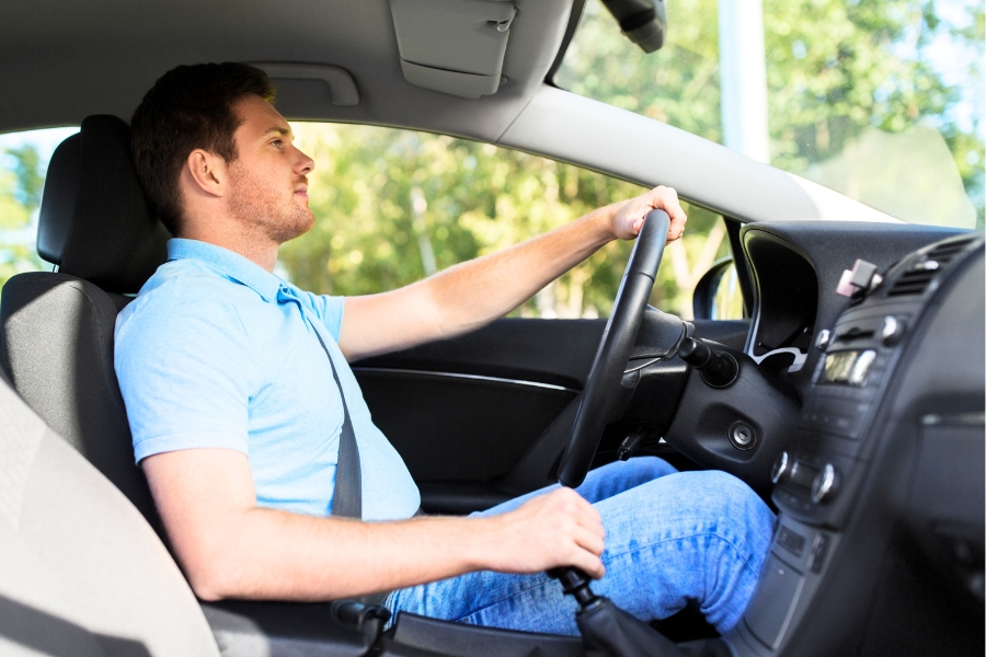 Man Driving a Car